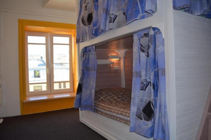 Bunk bed in a dormitory room for men and women